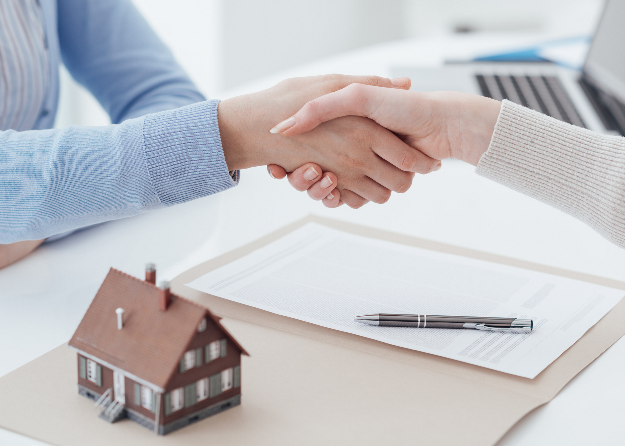 Handshake over real estate deal