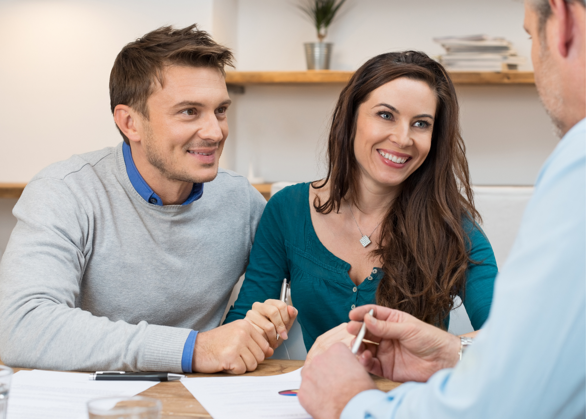 Couple in mortgage consultation with Chester County broker